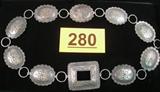 Jewelry Vintage Sterling Silver Concho Belt Solid Sterling Silver concho belt with large oval and square pieces, have engraved designs and scalloped edges. No markings of any kind, measures 29.5" length.
Total Weight: 128.2 grams / 4.125 ozt