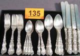 Sterling Gorham "Imperial Chrysanthemum" Flatware Vintage "Imperial Chrysanthemum" flatware pieces, made by Gorham. Some pieces have monograms.
Partial set includes:
6 Blunt hollow knives with bolster and Stainless Steel blades, measure 9.5" long.
6 Large teaspoons / serving spoons, measure 7" long.
10 Teaspoons, measure 5.75" long.
12 Dinner forks, measure 6.75" long.
Total weight: 47.980 ozt.