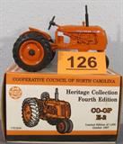 Farm Toy Heritage Co-Op "E-2" Model Tractor 1:16 scale die cast metal Limited Edition Heritage Collection Co-Op (Cooperative Council of North Carolina) "E-2" toy model tractor, made by the Ertl Company. Includes Certificate of Authenticity and original box with matching serial number, in good physical condition but front sticker corners are beginning to peel. Has been previously displayed in a smoke and pet free home.