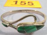 Jewelry Sterling Silver & Malachite Bracelet Hinged Sterling Silver bangle bracelet with inlaid green Malachite stones, made in Mexico. Measures 7.25".
Total Weight: 42.7 grams / 1.375 ozt