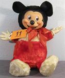 Vintage Plush Mickey Mouse Toy Doll Darling, vintage "Gunderful Tweak and Squeak" stuffed animal of Walt Disney's character: Mickey Mouse.
Plush doll with rubber hands and face, shows some wear from age, but overall in great condition.
Measures 11.25" tall.