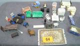 Mixed Lot of Vintage Figural Toy Doll Furniture Vintage plastic, metal, and possibly celluloid dollhouse furniture pieces including chairs, tables, bathroom and kitchen sets, high chair, stroller and more! Also has a couple pieces made by Concord Miniatures, Ideal, Plasco, and Durham Industries.