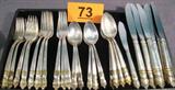 Sterling Towle "Danish Baroque" Flatware Pieces Vintage sterling silver flatware set "Danish Baroque" with gold accent, made by Towle Manufacturing Company.
Incomplete set includes:
6 Modern hollow knives, with stainless steel blades, measure 8.75" long.
1 Hollow handle master butter knife, measures 7" long.
4 Tablespoons, serving spoons, measure 7" long.
6 Teaspoons, measure 6" long.
6 Dinner forks, measure 7.5" long
6 Salad / dessert forks, measure 6.75" long.
Total weight: 51.270 ozt.