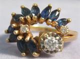 Jewelry 14kt Gold Ladies Ring Sapphires & Diamonds A beautiful 14kt yellow gold prong set ladies ring with deep blue Sapphires and 3 round brilliant cut Diamonds.
Larger diamond is approximately 0.13 ctw, 2 smaller diamonds are approximately .02 ctw each.
Size 6.5, Total weight is 3.1 dwt.