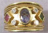 Jewelry 14k Yellow Gold Diamond & Gemstone Ring Gorgeous 14k yellow gold ring set with a diamonds and gemstones. Center stone is an oval cut amethyst, surrounded by 4 round brilliant cut diamonds of approx .03ctw each, and flanked by a square cut peridot and a square cut garnet. Lots of detail, and "designer touches" on this ring that presents as brand new condition! If it was ever worn at all, it was VERY WELL cared for!
Sized 7.5, marked 14k.
Total weight is 7.5 dwt.
