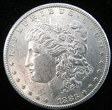 Coin 1883-S Morgan Silver Dollar Gem BU 1883-S Morgan Silver Dollar. A beautiful coin graded by the consignor as Gem Brilliant Uncirculated condition. An Extremely Rare date in the series. No sales tax on coins, bullion or currency.