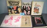 Vintage Beatles & Rolling Stones Memorabilia "The Rolling Stones: The First Twenty Years" paperback book by David Dalton, Copyright 1981.
"The Beatles A to Z" paperback book by Goldie Friede, Robin Titone & Sue Weiner, Copyright 1980.
"The Beatles Illustrated Lyrics" hardback book edited by Alan Aldridge, Copyright 1969.
"Los Beatles El Subarino Amarillo" advertisement poster printed in Spanish, measures 14" length x 11" height.
"Beatles In Their Own Words" paperback book compiled by Miles, Copyright 1978.
Vintage paper from the Gold Key Comics "Club News", article for 'new poster comics'. Features The Beatles and Chitty Chitty Bang Bang. Dated 1968.