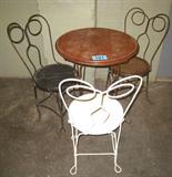 Furniture Antique Parlor Chairs & Table Set Lovely vintage wooden ice cream parlor table and 2 chairs with Cast Iron legs and seat backings, no maker name or markings of any kind. Usual signs of surface and edge wear due to age, would make a great garden or patio table! Chairs measure about 35" height x 16" width x 14.5" diameter seat; Table measures 30.25" height x 24" diameter.