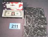 Coin 4 2004 Presidential Election Dollars A crisp uncirculated 2003 dated One Dollar bill with George Bush photo replacing G. Washington's. Comes with a beautiful presentation folder with information. 4 Notes total. Actual $1 Bill. Issued by the United States Monetary Exchange.