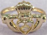 10k Yellow Gold & Diamond Claddagh Ring Lovely gold Claddagh ring with approx .03 ctw round brilliant cut diamond. Marked 10k. Sized 4.25. Weighs 1.2 dwt.