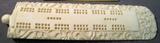 Oriental Style Ivory Cribbage Board Game Beautiful Oriental style hand carved ivory cribbage game piece with dragon design. Wooden playing pieces are held inside twist off top. Measures 6.5" long.