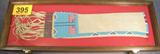 Antique Sioux Pipe Bag Certified Original A genuine Sioux Indian Pipe Bag. A very rare item certified original by CADDO Trading Company. Made between 1890-1910. Has nice bead work with an American Flag Pattern. Found in Minnesota. Valued at $900 in the 1980's. Measures over 23" long with leather frills. Comes with a beautiful wood and glass display box.