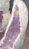 Large Brazil Amethyst Cathedral Geode A beautiful Brazil Amethyst Cathedral Geode removed from a cave. The inside of this huge stone is encrusted with deep rich purple color amethyst gemstones. Measures an impressive 20" wide by 29" tall! A very heavy piece with an estimated weight of over 100lbs.