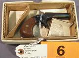 Gun Ramshorn 22lr. Derringer with Box A very cool reproduction derringer that shoots 22 Caliber Long Rifle ammo. Comes with the box and papers. Very well made. Appears to be complete and in good order. Condition will grade at 85% with only wear on the high spots. #6177 Ranshorm Model Derringer in 22lr. Serial Number #122 Single Shot Derringer.