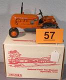 Farm Toy Ertl Co-Op "E2" Model Tractor w/ Box Limited Edition Cockshutt Universal Co-Op "E2" toy model tractor made by the Ertl Company, second in a series. Comes with original box and packaging, corner of front sticker is beginning to peel. Comes in a matching E2 box but unsure if its original factory box.