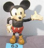Department 56 Disney Mickey Mouse Figurine Darling vintage looking Department 56 resin figurine of Walt Disney's character Mickey Mouse. Has original price tag on bottom. Measures 9.25" tall.
