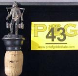 Vintage Sterling Top Water Carrier Figure Cork
A vintage bottle cork, appears to have a sterling silver top that is a figure of a man carrying two pails of water. Measures approximately 4.5" tall.
Total weight = 2.14 ozt.