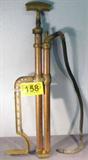 Vintage Bicycle / Car Tire Manual Air Pump
A vintage manual air pump is marked "F.E. Myers & Bro" on one side of the handle and "Ashland - USA" on the other side. All metal pump and handle with a rubber hose. Shows signs of wear from age and use. Measures 25" tall.