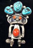 Jewelry Sterling Silver Kachina Ring w/ Turquoise
Fabulous sterling silver ring with large Southwestern style Kachina design. Ring is decorated with turquoise nugget stones and polished red coral. Signed "M Caers M", ring size: 7.5. Total weight: .43 ozt.