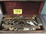 Mixed Lot Vintage Tools Measuring Devices Wood Box
Lot contains a wooden box full of vintage tools and measuring devices. Box measures 3.5" tall x 16" wide x 6.75" deep.