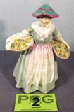 Royal Doulton "Daffy Down Dilly" Figurine
A beautiful Royal Doulton bone china figurine, Daffy Down Dilly. Stamped with the Royal Doulton hallmark. The catchy name 'Daffy-down-dilly' originates from the novel Little Daffydowndilly which was written by the acclaimed American author Nathaniel Hawthorne. There are no chips, cracks or crazing on this piece. Measures approximately 8" tall.