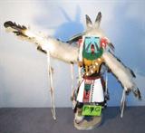 Hopi Kachina Doll Carved Wood Signed Henry Slaun
A beautiful Hopi Kachina Doll. Appears to be hand carved and decorated. Signed on the bottom "Henry Slaun". One arm has an age crack on the back side. Measures approximately 22" tall.
From the internet: "Hopi Kachina Dolls are effigies made of cottonwood that embody the characteristics of the ceremonial Kachina, the masked spirits of the Hopi Native American tribe. According to the Hopi, Kachina dolls are objects meant to be treasured and studied, and are not to be considered idols of worship or children’s toys."