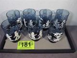 Lot of 7 Blue Mary Gregory Glass Tumblers
A set of seven Mary Gregory blue glass tumblers made by Libby Glass. Each glass has a scene of a small boy, a girl and a dog walking in a meadow. Each measures 4.75" tall with a 2.75" diameter. No chips, breaks or cracks.