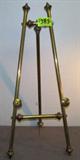 Brass Art Display Easel / Stand
A beautiful brass display easel / stand for that special painting, photograph or other suitable artwork. This tripod type stand measures 38" tall with a 16.5" front width.