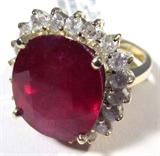 Jewelry 14kt Yellow Gold Ruby & Diamond Ring
Stunning 14kt yellow gold Ruby & diamond ring. Included GLA Premium Appraisal reads: "One lady's polished, stamped and electronically tested solid 14kt yellow gold ring mounted with: 1 Genuine Ruby (Corundum) and 20 genuine round full diamonds. This item weighs 9.70 grams and fits a finger size 8.25. The setting measures 20.76 x 19.70mm and the band measures 2.24mm graduating up to 2.53mm at the center of the shank. The condition is brand new. The gemstones have been analyzed in the mounting.
Main Gemstone:
Identity: Genuine Ruby (Corundum)
Shape: Cushion (faceted)
Measurements: 15.38 x 13.36 x 7.94mm (est.)
Quantity: 1
Carat weight: 14.52 cts (est.)
Clarity Type: II=may include eye-visible features
Hue: Cherry Red
Transparency: Semi-transparent
Tone: Light-Medium
Saturation: Vivid-Bright
Polish: 7-Very Good
Finish: 8-Very Good-Excellent
Quality: 5-Good
Adjacent Gemstone:
Identity: Genuine Diamond
Cut: Round Full (faceted)
Measurements: 2.60