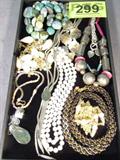 Jewelry Mixed Lot Costume Necklaces & Beads
Valentine's Day is just around the corner and there are many nice pieces in this lot that would make lovely gifts. Here is a sampling of what you'll get:
- Single long strand pearl like necklace.
- Black bead and gold color chain braided necklace.
- Natural turquoise stone necklace.
- Mother of Pearl flower design necklace.
- Monet silver color zipper or bolo style necklace.
- Much more.
Z135