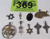 Jewelry Mixed Lot Costume Pendants Crucifix & More
Mixed lot of gold & silver colored necklace pendants that are religious in nature. Items in this lot include:
- Delicate dark silver colored pendant / crucifix, featuring an individual hanging upon a cross that has a circular halo behind it, unknown phrases written on the top front and all along the back in ancient Greek, Celtic style engravings around the halo. Measures 1.5" long (est).
- Large "Star of David" pendant. A silver colored circular frame houses a gold colored Star of David emblem with a copper colored cross inlaid. Upon the top horizontal bar of the gold emblem is a phrase written in ancient Hebrew, with the words "Jesus Christ" engraved underneath upon the horizontal cross member. An unknown phrase in ancient Greek is engraved upon the top of the silver circle. A lovely piece, measures 1.5" in diameter (est).
- Beautiful silver colored pendant in the shape of the Star of David, hammered metal style. Simple, elegant.
- Wo