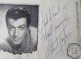 Robert Taylor Autographed Album Page JSA
A hand signed album page of Robert Taylor dated Oct 4, 1938. Accompanied by an alphanumeric Basic Cert card from James Spence Authentication, LLC, which certifies that the signature is genuine. The unique serial number, G03253, can be confirmed at any time at www.SpenceLOA.com.
From the internet: "Robert Taylor (August 5, 1911 – June 8, 1969) was an American film and television actor. Born Spangler Arlington Brugh in Filley, Nebraska. After Brugh signed a seven-year contract with Metro-Goldwyn-Mayer for $35 a week, his name was changed to Robert Taylor. He made his film debut in the 1934 comedy, Handy Andy, opposite Will Rogers (on a loan-out to 20th Century Fox). After appearing in a few small roles, he appeared in one of his first leading roles in Magnificent Obsession, with Irene Dunne. This was followed by Camille, opposite Greta Garbo. Throughout the late 1930s, Taylor appeared in films of varying genres including the musicals Broadway Melo