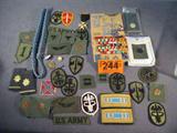 Mixed Lot U.S. Army Insignia / Rank / Unit Crest
A mixed lot of U.S. Army military ribbons, brass insignia, and unit crests. Uniform rank epaulets and brass which include 1st and 2nd Lieutenant, Captain, Major and Lt. Colonel.