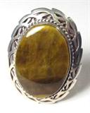 Jewelry Sterling Silver / Tigers Eye Ladies Ring
Beautiful sterling silver ladies ring, featuring a large tiger's eye in a flat / platform style setting, accentuated with a thin silver rope design, with unique leaf style design surrounding the stone. Adjustable sterling silver band, marked / signed "Salinas en Mexico 925". Currently set to fit size 8.
Total weight: 0.32 ozt