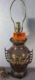 Vintage Cloisonne Style Chinese Table Lamp
A vintage Cloisonne style table lamp marked "China" on the bottom. There are a few small chips in the enamel. Lamp measures 24.5" tall and does not include a shade.