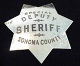 Sterling Silver Franklin Mint Sheriff Badge
Fabulous sterling silver Franklin Mint western style police badge. Star shaped badge reads: "Special Deputy Sheriff Sonoma County". Measures: 2.5" long x 2.25" wide. Marked "FM 1987 sterling silver", total weight: .53 ozt.
Tag word: Sterl925
