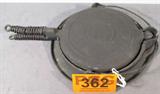Vintage Montgomery Ward Cast Iron Waffle Maker
A vintage cast iron waffle maker manufactured by Montgomery Ward patented Sep 15, 1925. Item has a small amount of rust around edges. Measures 9.5" in diameter.