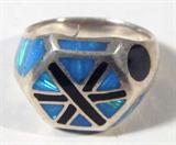 Jewelry Sterling Silver Opal & Onyx Ring
Fabulous sterling silver ring with hexagon shaped featuring inlaid onyx and vivid opal stones. Marked "925", ring size: 6.25. Total weight: .23 ozt.