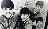 Beatles Album w All Fab Four Autographs VJ Records
A Vee-Jay Records Beatles album. Each band member has signed on or near his own photo image on the cover. Album cover is numbered VJ1092, vinyl record is numbered VJLP 1062. Signatures are not officially authenticated. Other items provided by this consignor have all been certified and to the best of our knowledge these signatures are authentic. Songs on this album include Do You Want To Know a Secret?, Twist and Shout, Chains, I Saw Her Standing There, and others.
From the internet: "The Beatles were an English rock band, active throughout the 1960s and one of the most commercially successful and critically acclaimed acts in the history of popular music. Formed in Liverpool, by late 1962 the group consisted of John Lennon (rhythm guitar, vocals), Paul McCartney (bass guitar, vocals), George Harrison (lead guitar, vocals) and Ringo Starr (drums, vocals). Rooted in skiffle and 1950s rock and roll, the group later worked in many genres ra