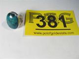 Jewelry Sterling Silver Turquoise Ring
Fabulous sterling silver ring with large green colored stone, possibly turquoise. Signed / marked: "DR sterling 925", ring size: 6.25. Total weight: .34 ozt.
