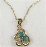 Jewelry Emerald & 14kt Gold Necklace
Beautiful 14kt Gold Setting with 2 10pt. Green Emerals and 1 Brilliant Cut Diamond at .01pt. Chain is 14kt Gold and measures 16" in length. 1.2 DWT. ZB4487