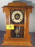 Vintage Key Wind Mantle Clock w/ Glass Door
Beautiful carved wood mantle clock has a glass front door with painted gold trim. Key wind, working condition unknown. Pendulum and key are located inside glass door. Measures 19" tall x 14.5" wide x 5" deep.