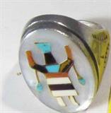 Jewelry Sterling Silver Navajo Dancer Large Ring
Beautiful sterling silver Southwestern / Navajo ring with inlaid multi colored stones (possibly Mother of Pearl, shell, onyx, turquoise & ivory or bone) arranged into a Navajo dancer or priestly figure. Ornate engravings on the sides of the silver portion of the ring, marked / signed "Navajo RB". Fits a finger size 11.5.
Total weight: 0.95 ozt