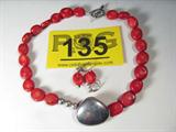 Jewelry 2 Pc. Set Silver Coral Necklace + Earrings
Beautiful 2 piece jewelry set:
- Breathtaking sterling silver & coral necklace, featuring several flattened round beads of coral, with naturally occurring eye visible characteristics and a silver soft triangle shaped pendant marked "925". Necklace terminates at a toggle clasp, slight separation in the loop of the toggle. Necklace measures 17.5" long.
- Beautiful coral dangle earrings, some naturally occurring eye visible characteristics in the coral. Color fades from deep red into an almost pinkish color in the center.
Total weight: 2.7 ozt