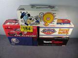 NASCAR Lot of 5 Die Cast Cars Waltrip Burton More
A great lot for NASCAR collectors with these five adult collectable toy / replica die cast cars. All cars appear to be in excellent condition and in their original boxes:
- 1:24 scale stock car, #66 Darrell Waltrip, 1999 Taurus, Route 66 Tour 2000, sponsor K-Mart. Action Performance car / bank.
- 1:24 scale stock car, #99 Jeff Burton, Green Lantern / Justice League DC Comics. Manufactured by Team Caliber.
- 1:24 scale stock car, #31 Neil Bonnett, 1992 Lumina, sponsor Mom 'n' Pop's. Manufactured by Action Performance.
- 1:24 scale stock car, #19 Dodge Show Car, 2000 Intrepid R/T. Produced by Action Performance.
- 1:24 scale stock car, #9 Lake Speed, 1998 Ford Taurus, sponsor Cartoon Network. Action Performance bank / car.