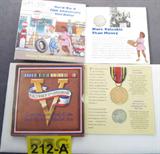 Coin World War II Commemorative Coin & Medal
Display containers containing: 50th World War II 50th Anniversary Half-Dollar. 50th World War II 50 th Anniversary Half-Dollar and Reproduction World War II Victory Medal. Half-Dollar is dated 1991-1995. No Sales Tax on Coin, Currency, or Bullion.