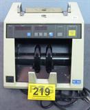 NC-50 Toyocom Bill Counter
Automatically "remembers" correct note size, then registers errors for off-size banknotes.
For use at banks, supermarkets, amusement centers, etc.- anywhere you need to count currency quickly and accurately.
Counting speed of 1,200 notes/ minute.
Full range of counting modes: free count, batch count, batch-repeat count, cumulative count.
Electronic photo sensors ensure accurate counting in all modes.
Dimensions: 280 x 210 x 290 mm (11.0 x 8.3 x 11.4 in)