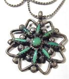 Jewelry Sterling Silver Petite Point Jade Necklace
Gorgeous sterling silver necklace featuring a star / flower shaped pendant with light green, possibly jade stones arranged in the shape of an 8 point flower, rope design throughout, hanging upon a sterling silver rope chain marked / signed "Italy 925". Chain measures 18" long.
Total weight: 0.25 ozt