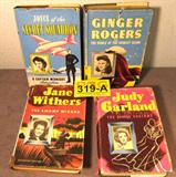 Lot of 4 Whitman Books for Girls 1940's
A fantastic lot of 4 vintage books published by Whitman Publishing Co., Racine, Wisconsin as "Whitman Books for Girls" series. Each book appears to have the original paper jacket cover. Lot includes:
- "Joyce of the Secret Squadron", a Captain Midnight adventure featuring a character based on Joyce Ryan as the role she played in the radio series. Copyright 1942. Author R.R. Winterbotham.
- "Judy Garland and the Hoodoo Costume", an original story by Kathryn Heisenfelt featuring Judy Garland as the heroine. Copyright 1945.
- "Ginger Rogers and the Riddle of the Scarlet Cloak", an original story featuring Ginger Rogers as the heroine. Written by Lela E. Rogers. Copyright 1942. Inside jacket cover has the following advertisement: "For Victory----Save cooking fats and grease! Grease makes bullets and shells and bombs for our soldiers. You can help them win!".
- "Jane Withers and the Swamp Wizard" by Kathryn Heisenfelt. The heroine of the story, Jane W