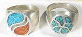Jewelry 2 Sterling Silver Turquoise & Coral Rings
Lot of 2 Beautiful sterling silver Southwestern style rings:
- Wonderful sterling silver ring with flecks of turquoise tightly packed & inlaid between designs of silver. Thick band, fits a finger size 10.25.
- Beautiful sterling silver ring featuring coral, Mother of Pearl & turquoise chip inlay style in an oval shape with the white stone inlay running through the middle in a wavy stripe. Fits a finger size 9.
All items are confirmed by consignor as authentic sterling silver.
Total weight: 0.67 ozt